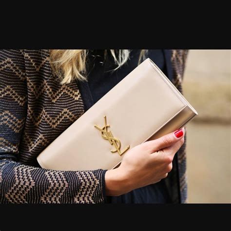 ysl wristlet beige|YSL tuxedo clutch.